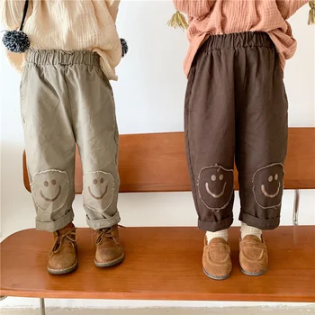 Primavera, outono estilo coreano crianças joelho patch casual calças de Meninos e meninas de algodão perder toda a correspondência calças